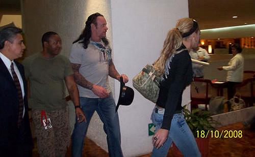 3083209868_35a2e46aee - undertaker cu michelle mccool