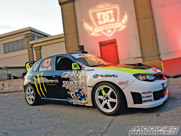 modp_0909_20_o 2009_subaru_impreza_sti passenger_side_view