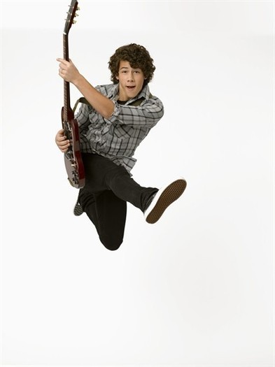 Nick-Jonas-camp-rock-1404359-412-550 - Jonas Brothers