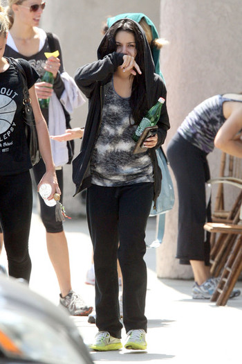 Vanessa+Hudgens+hides+face+behind+arm+leaves+cTJYqC1EbWQl