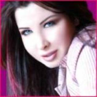 XIYIIPNTCFZNRCCYQZM - Nancy Ajram