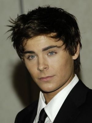Zac Efron with dark hairstyle in spiky style - poze high school musica
