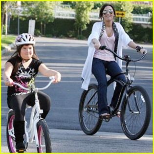 demi-lovato-madison-de-la-garza-bike-ride - Demi Lovato and her litle sister