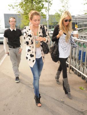 normal_01 - Appearances And Events Candids 2010 Arriving at Heathrow Airport in London June 6 2010