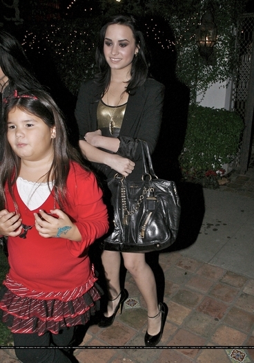 17670128_TTJZTSBSR - Demi Lovato is Heading to George Lopez Christmas party in Los Angeles