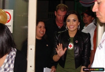 normal_001 - Demi Lovato 05-22-10 Visiting Red Cross in Chile
