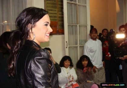 normal_019 - Demi Lovato 05-22-10 Visiting Red Cross in Chile