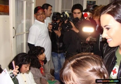 normal_021 - Demi Lovato 05-22-10 Visiting Red Cross in Chile