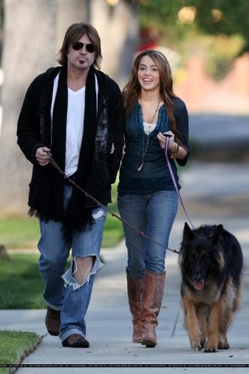 6oos90 - Miley walk the dogs with his father