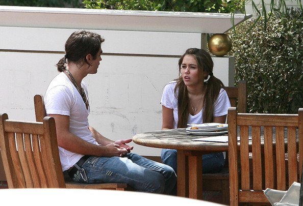 2h6vas4 - Mrs Miley having a talking with Justin Gaston after lunch at a studio