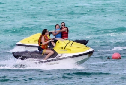 beachjetskiinbahamas130509-12 - Miley Cyrus Rides The Banana Boat
