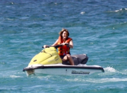 beachjetskiinbahamas130509-13 - Miley Cyrus Rides The Banana Boat