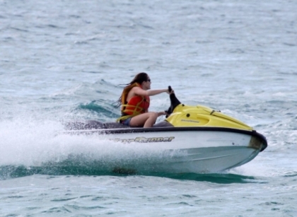 beachjetskiinbahamas130509-17 - Miley Cyrus Rides The Banana Boat