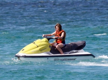 beachjetskiinbahamas130509-23 - Miley Cyrus Rides The Banana Boat