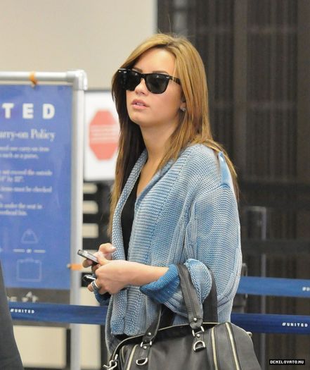 8 - Demi Lovato At the Burbank Airport2010 July 27