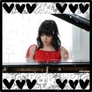 img-set - Demi Lovato playing the piano