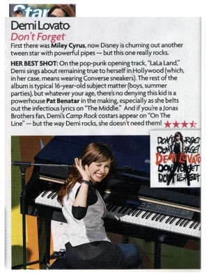 normal_star_album_review - Demi Lovato playing the piano