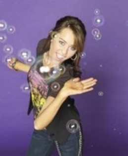 TIPYUNNRIAFTOFRTUVI - MILEY CYRUS la sedinte foto