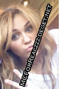 super - 0 MILEY CYRUS-RARE PIC