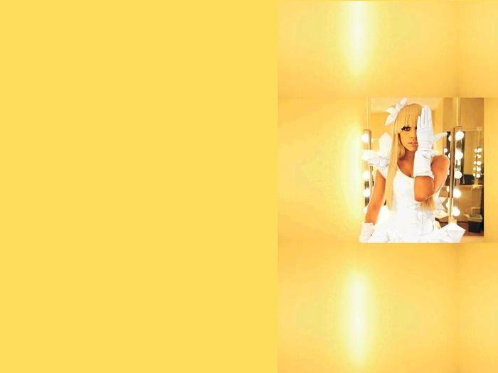 Lady-Gaga-yellow-background-lady-gaga-6583959-1024-768