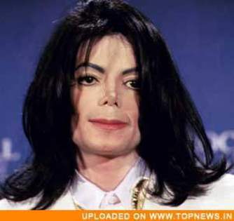 2 poze cu Michael Jackson