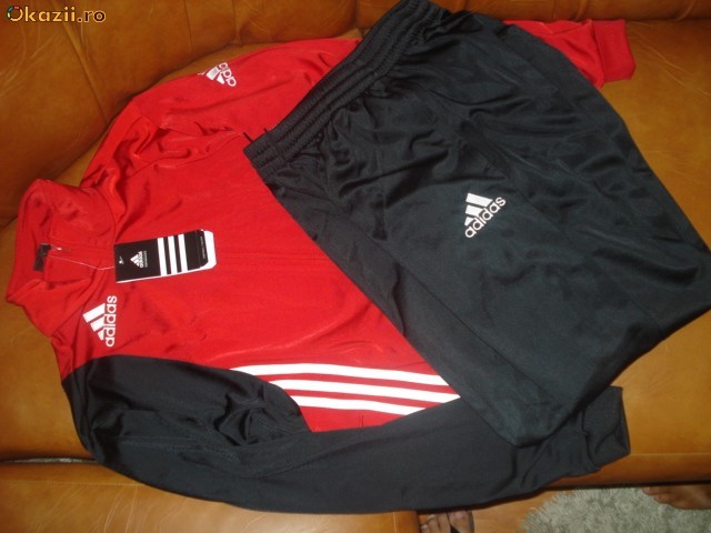Trening barbatesc Adidas-rosu cu negru; Marime:L si XL
Culoare:Rosu cu negru
Material:Poliester
Pantalon conic(fermuar) cu buzunare later
