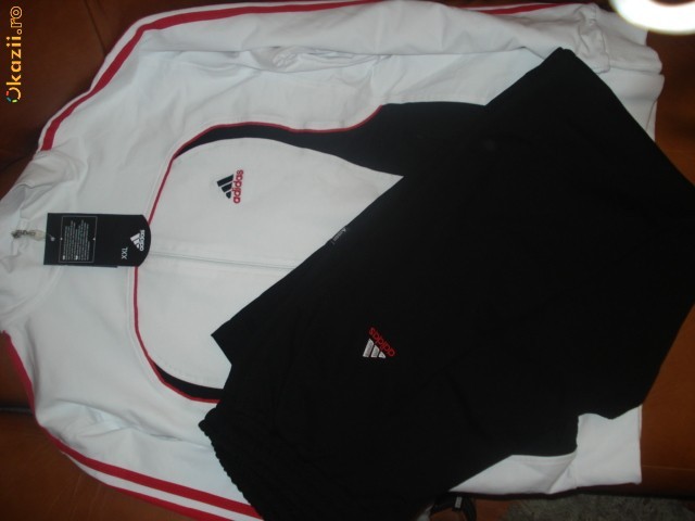 Trening barbatesc Adidas-alb cu negru; Marime:XXL
Culoare:Alb cu negru
Material:Bumbac 100%
Pantalon drept cu buzunare laterale
Pret:17

