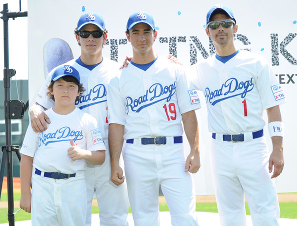 Nick+Jonas+Jonas+Brothers+Encourage+Fans+X+WvvsTuWmQyXl - Jonas Brothers Encourage Fans to X the TXT on Road Dogs Softball Tour