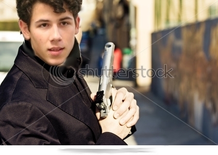 stock-photo-male-model-performing-secret-agent-with-gun-17976205