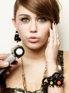 20081563_GBRWQRUHE - a poze sweet cu miley cyrus
