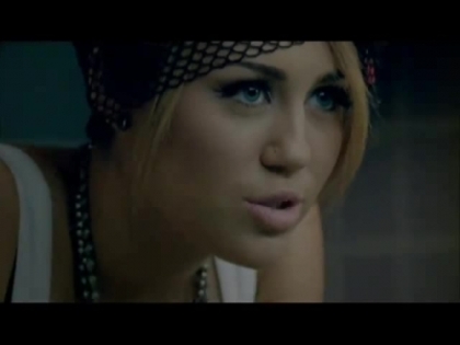 normal_Miley_Cyrus_-_Who_Owns_My_Heart_-_European_Single_056