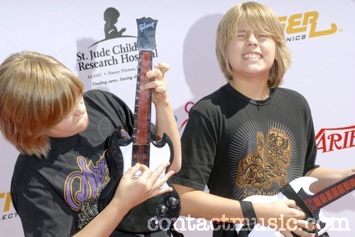 power_of_youth_23_wenn1609382 - Cole and Dylan Sprouse