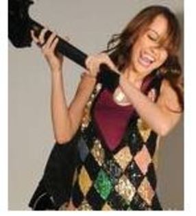  - 0 A MILEY CYRUS POZE EXTREM DE RARE A 0