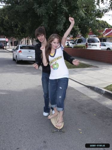 debby-ryan-0014 - Debby - Ryan - Gets - Skateboarding - Lessions - From - Her - Brother - Chris - Ryan