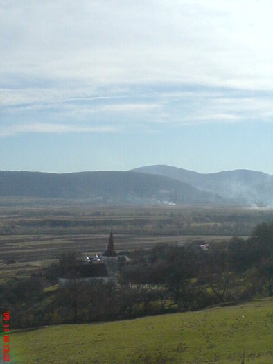 Biserica veche vazuta de pe deal - 2010 Excursie in orizontul local cls v-a Ungra 2010