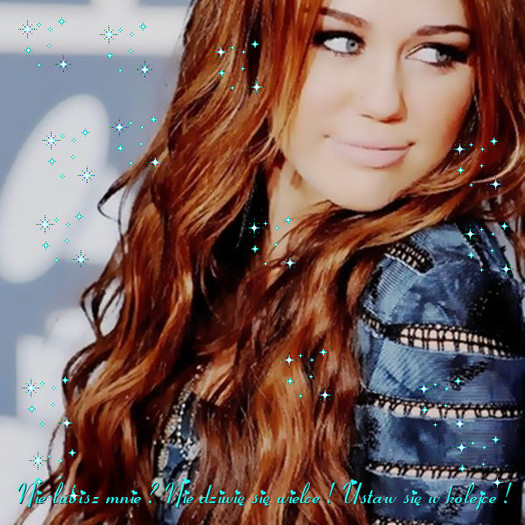 0072625599 - Miley glitter pics