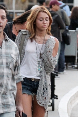  - x Miley Cyrus arrives at LAX Airport - 23th June 2010