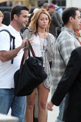  - x Miley Cyrus arrives at LAX Airport - 23th June 2010