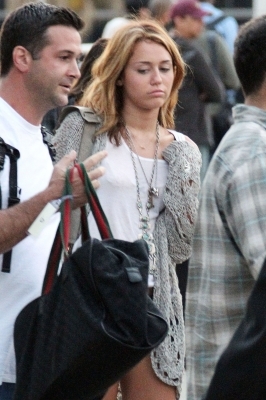  - x Miley Cyrus arrives at LAX Airport - 23th June 2010