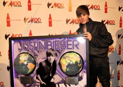  - LA Reid Presents Justin Bieber with Multi - Platinum Plaque December 10th