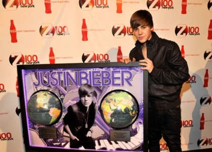  - LA Reid Presents Justin Bieber with Multi - Platinum Plaque December 10th