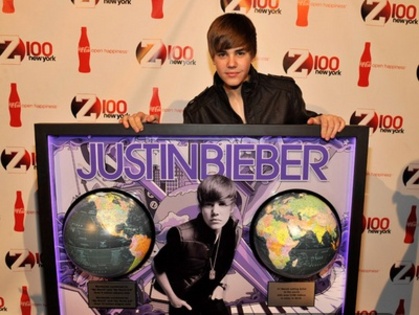  - LA Reid Presents Justin Bieber with Multi - Platinum Plaque December 10th