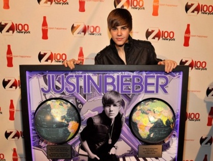  - LA Reid Presents Justin Bieber with Multi - Platinum Plaque December 10th