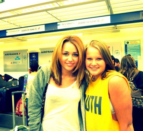 156574606 - 0 Miley  Cyrus  And  A  Fan In Toluca  Lake -  Meet And  Great
