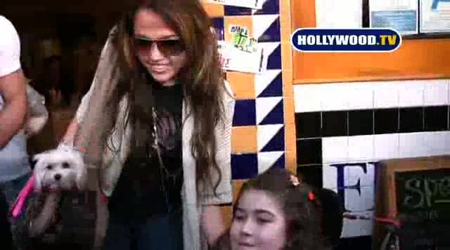 Miley Cyrus Sign Autographs For Fans At Market City. 128
