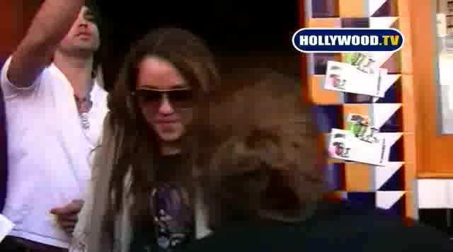 Miley Cyrus Sign Autographs For Fans At Market City. 133