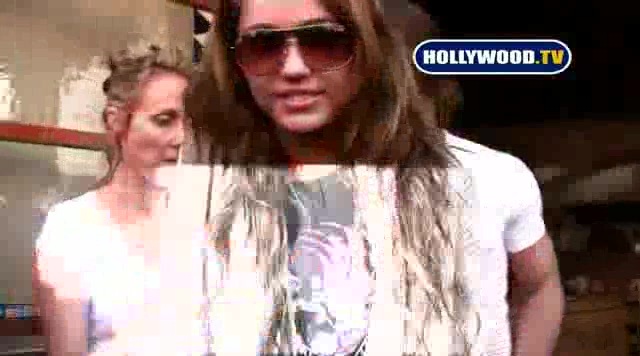 Miley Cyrus Sign Autographs For Fans At Market City. 136