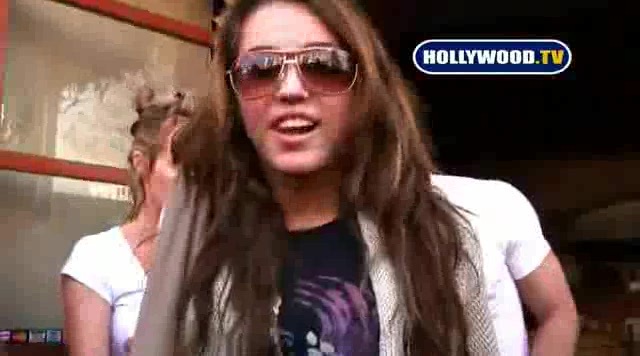 Miley Cyrus Sign Autographs For Fans At Market City. 137