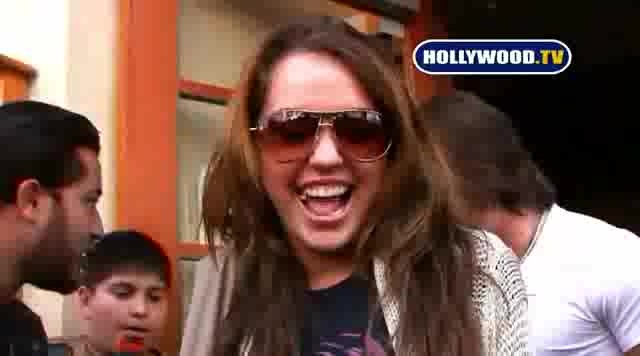 Miley Cyrus Sign Autographs For Fans At Market City. 139