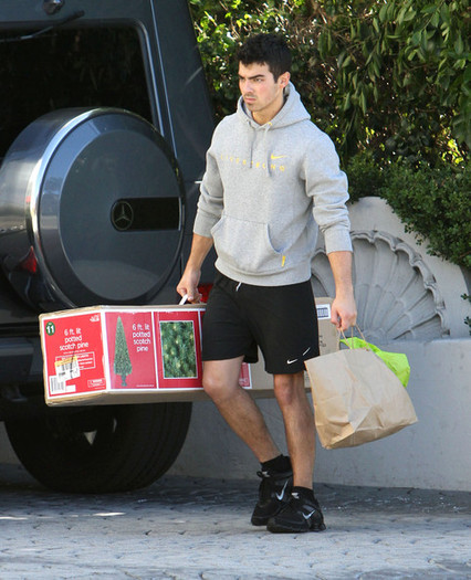 Joe+Jonas+Joe+Jonas+Bringing+Home+Fake+Christmas+aCYVb6zo4opl - Joe Jonas Bringing Home A Fake Christmas Tree